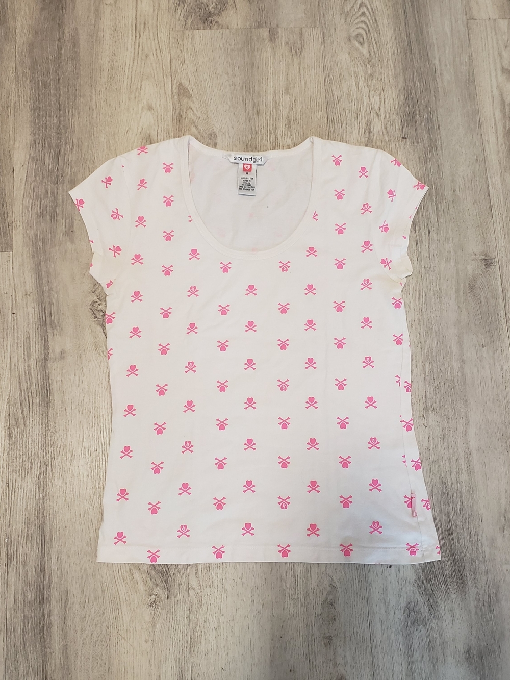 Soundgirl White Tee with Light Pink Skull Motif